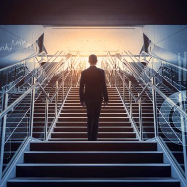 cso nw leadership sucess businessman ascending staircase surrounded by symbols of business acumen by metamorworks gettyimages 957655008 100801476 large